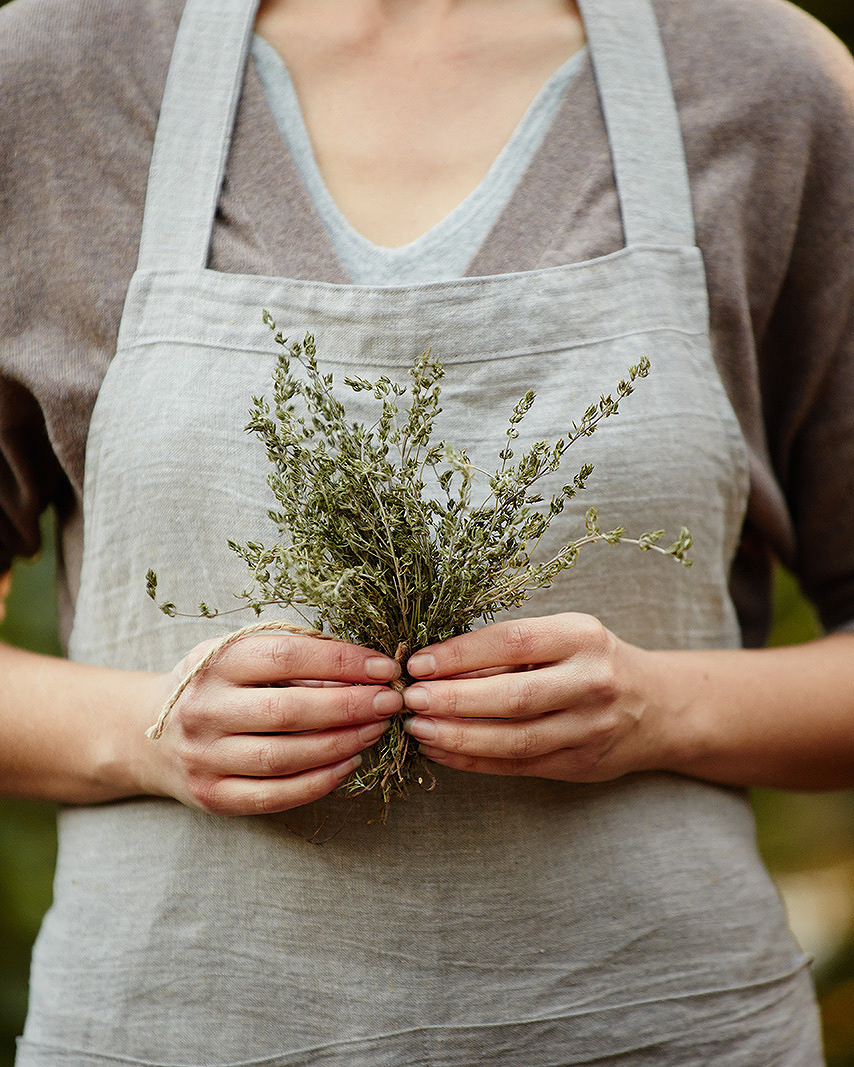 Woman holding herbs  | Trinette+Chris Photographers