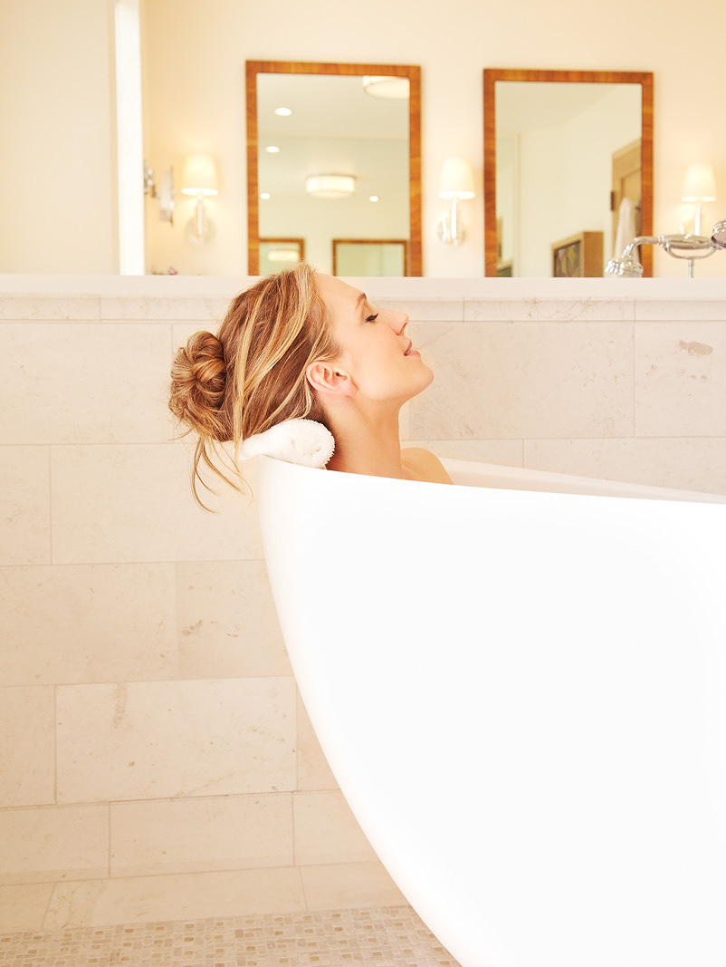 Woman in bathtub at Auberge Du Soleil  | Trinette+Chris Photographers