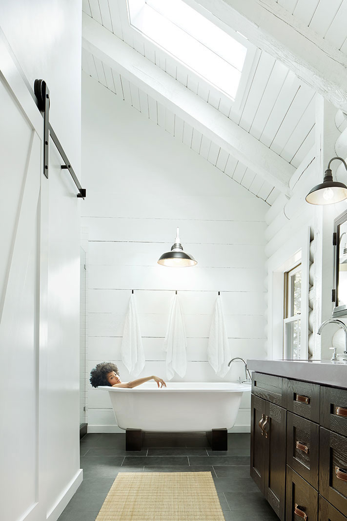 Woman in modern design bathroom  | Trinette+Chris Photographers